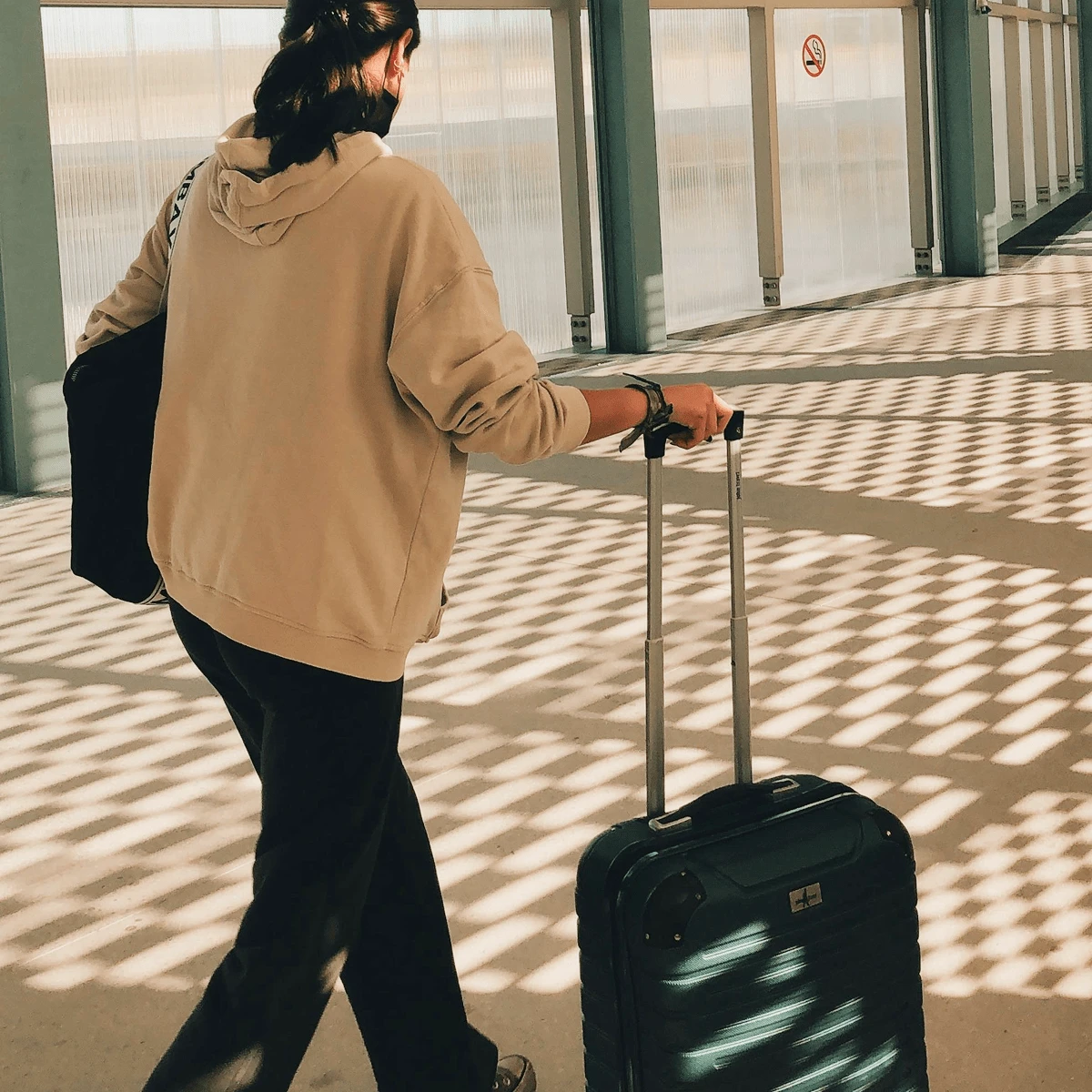 traveling through airport woman
